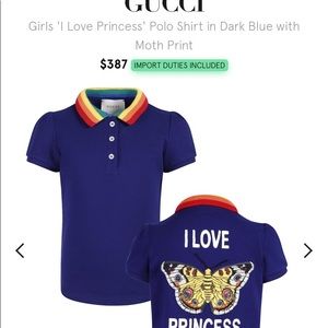 Gucci's little dark blue polo.